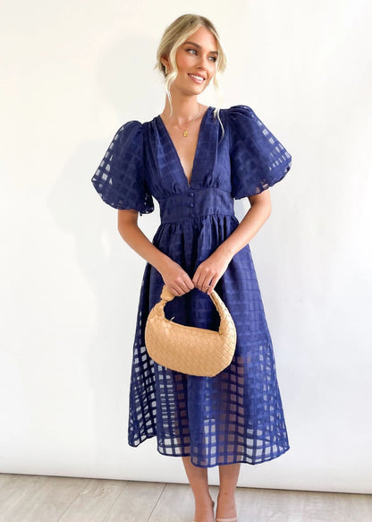 ZERA | PATTERNED FABRIC PUFF SLEEVE MIDI DRESS.
